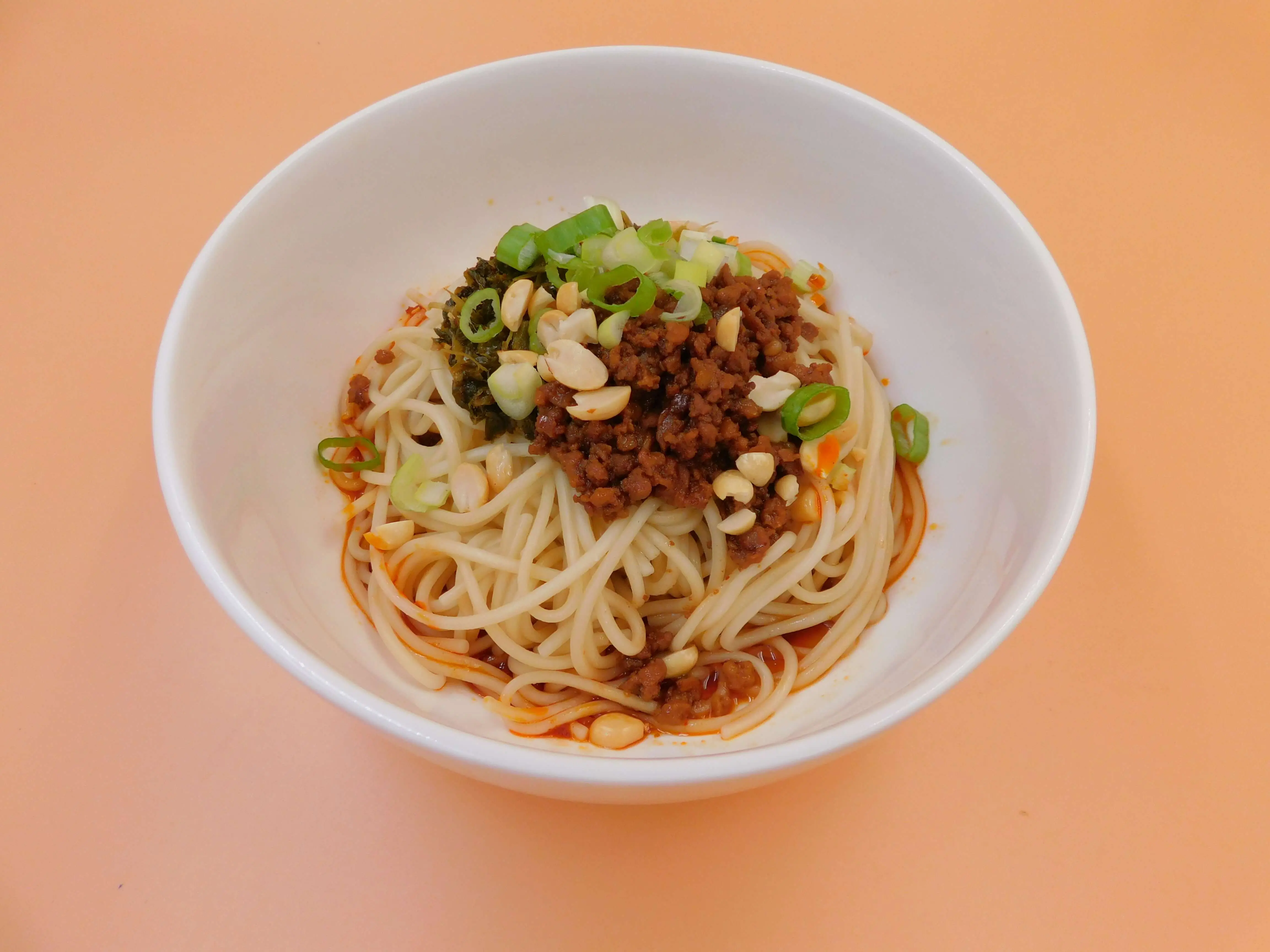 Impressive-Noodle&Okinii-Japanese-Restaurant-Asian-Fusion-Restaurant-Meat-Mince-Dry-Noodles-Massapequa Dry noodles with meat mince, peanuts and green onions at Impressive Noodle & Okinii Japanese Restaurant, a Asian Fusion Restaurant in Massapequa